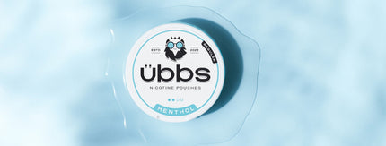 übbs Menthol nicotine pouch can with water splash detail