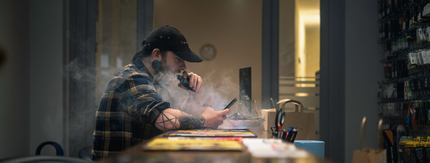 group of friends laughing together in a mountain range